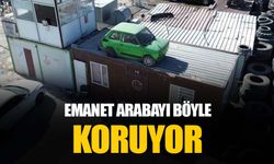 Arkadaşının emanet arabasına zarar gelmesin diye konteynerin üzerine koydurdu