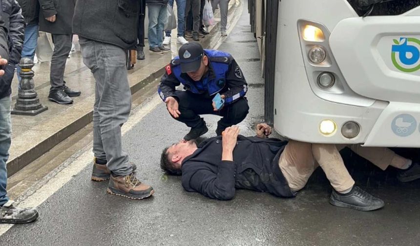 Otobüsün önüne atladı: Ezilmekten böyle kurtuldu
